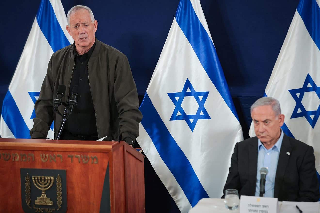 Minister-without-Portfolio Benny Gantz speaks to reporters at the Defense Ministry in Tel Aviv. Dec. 16, 2023. Photo by Noam Revkin Fenton/Flash90.