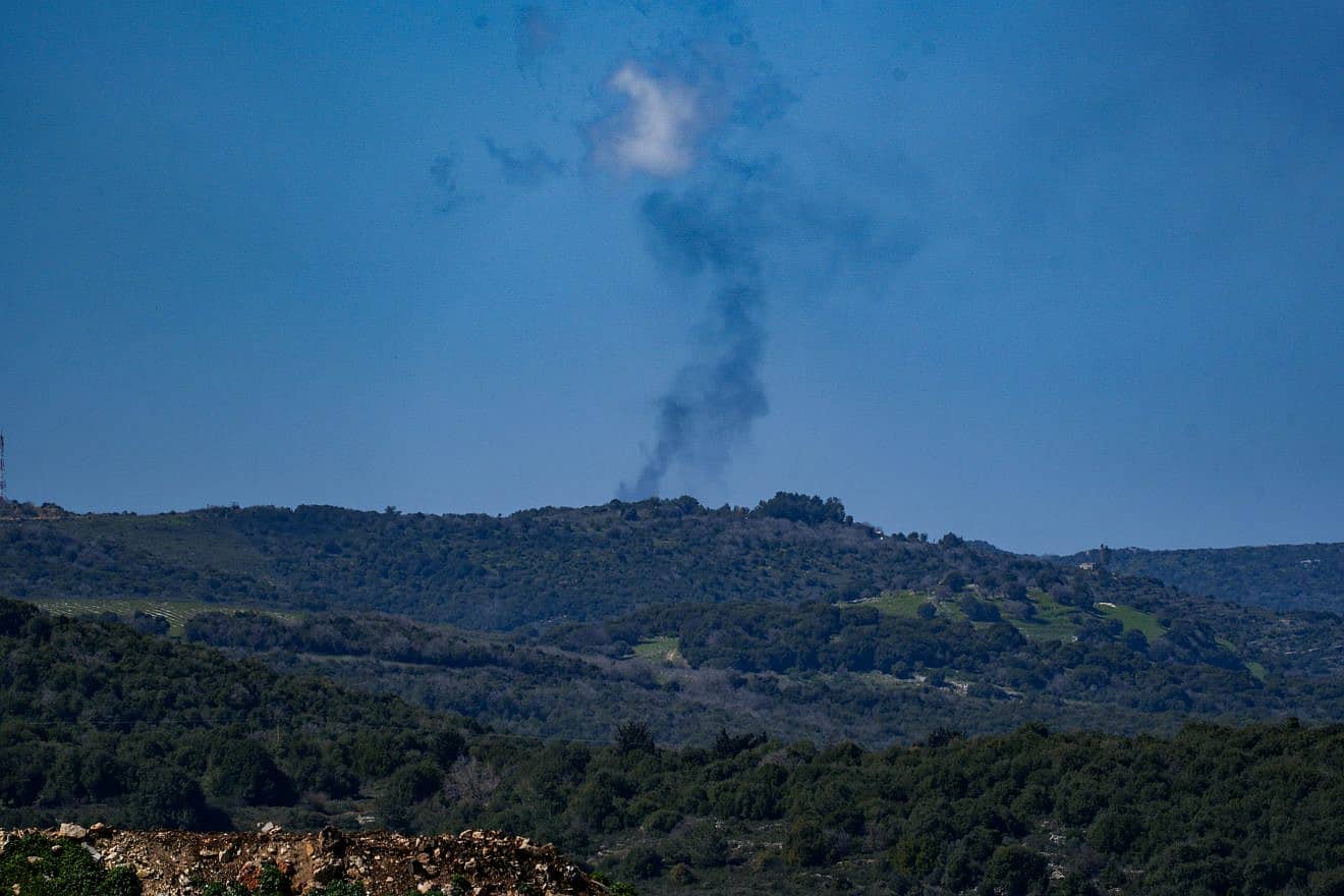 Smoke rises after rockets fired from Lebanon hit a military base near the Israeli border, March 5, 2024. Photo by Ayal Margolin/Flash90.