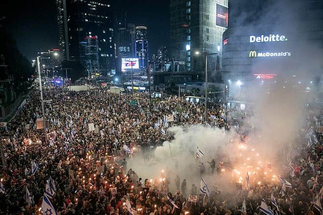 Demonstrators protest calling for the release of Israeli hostages held in the Gaza Strip and against the current Israeli government outside Hakirya Base in Tel Aviv, March 30, 2024. Photo by Miriam Alster/Flash90.