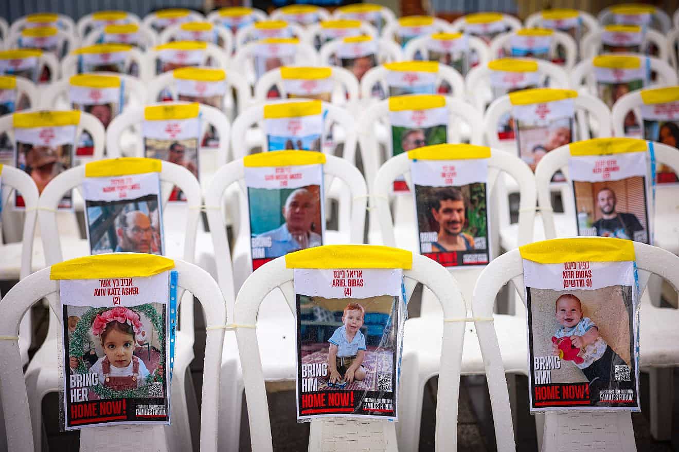 Empty chairs in the northern Israeli city of Tzfat show pictures of civilians being held hostage by Hamas terrorists in the Gaza Strip, Nov. 14, 2023. Photo by David Cohen/Flash90.
