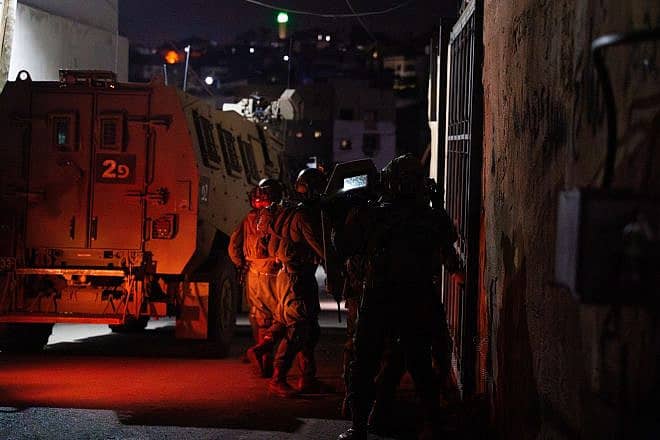 Israeli soldiers conduct counterterrorism operations in Judea and Samaria, March 24, 2024. Credit: IDF.