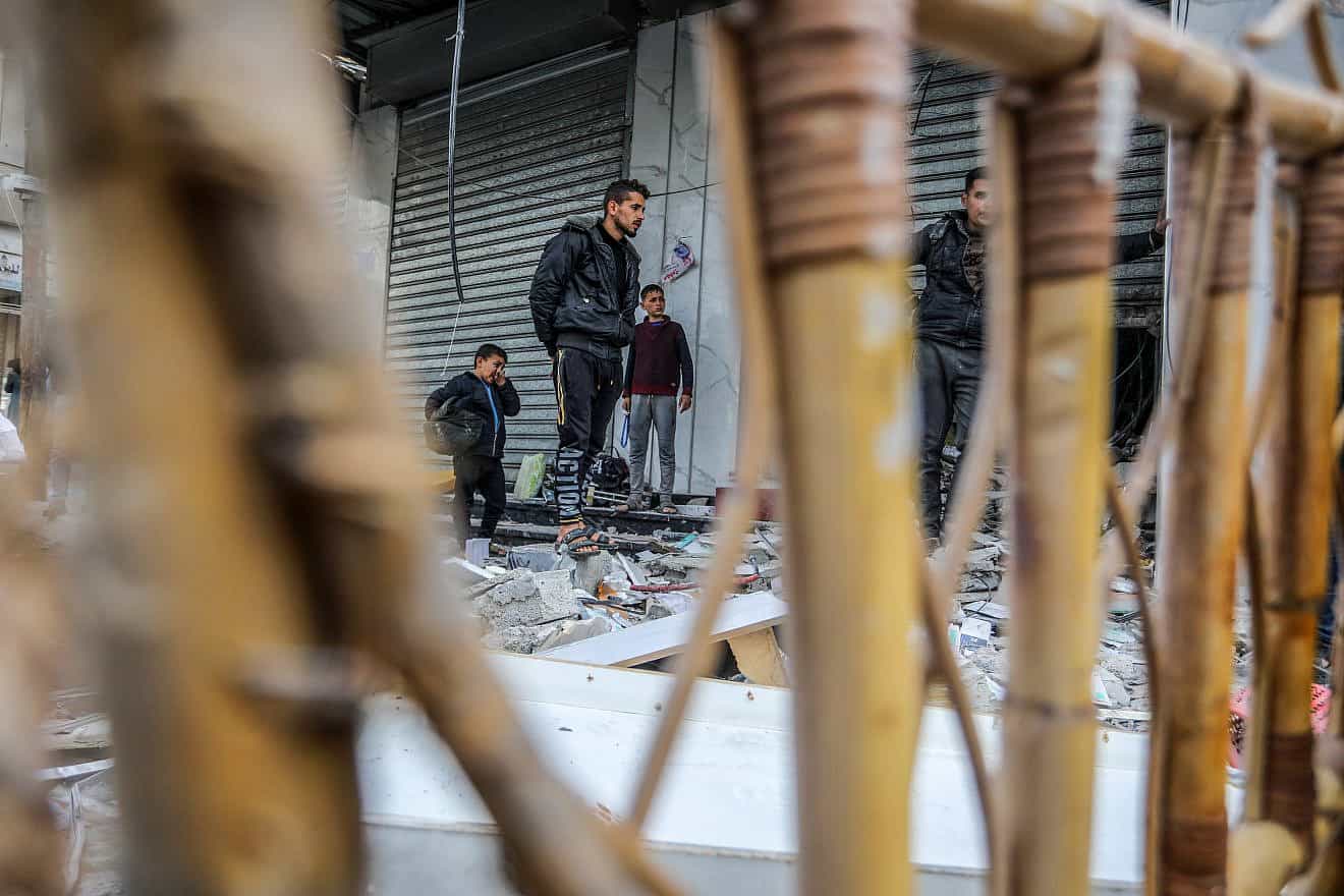 Palestinians at the site of an Israeli airstrike in Rafah, in the southern Gaza Strip, on March 4, 2024. Photo by Abed Rahim Khatib/Flash90.