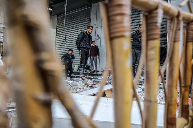 Palestinians at the site of an Israeli airstrike in Rafah, in the southern Gaza Strip, on March 4, 2024. Photo by Abed Rahim Khatib/Flash90.