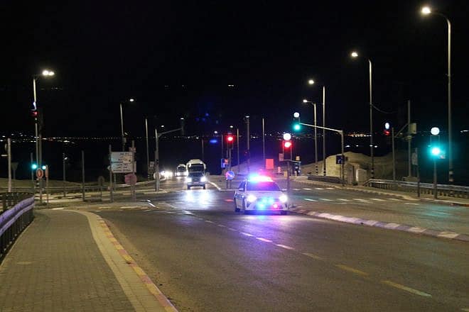 A convoy of buses with Gaza orphans and their companions passes through the outskirts of Jerusalem on its way to Judea, March 11, 2024. Credit: Nadia Matar.