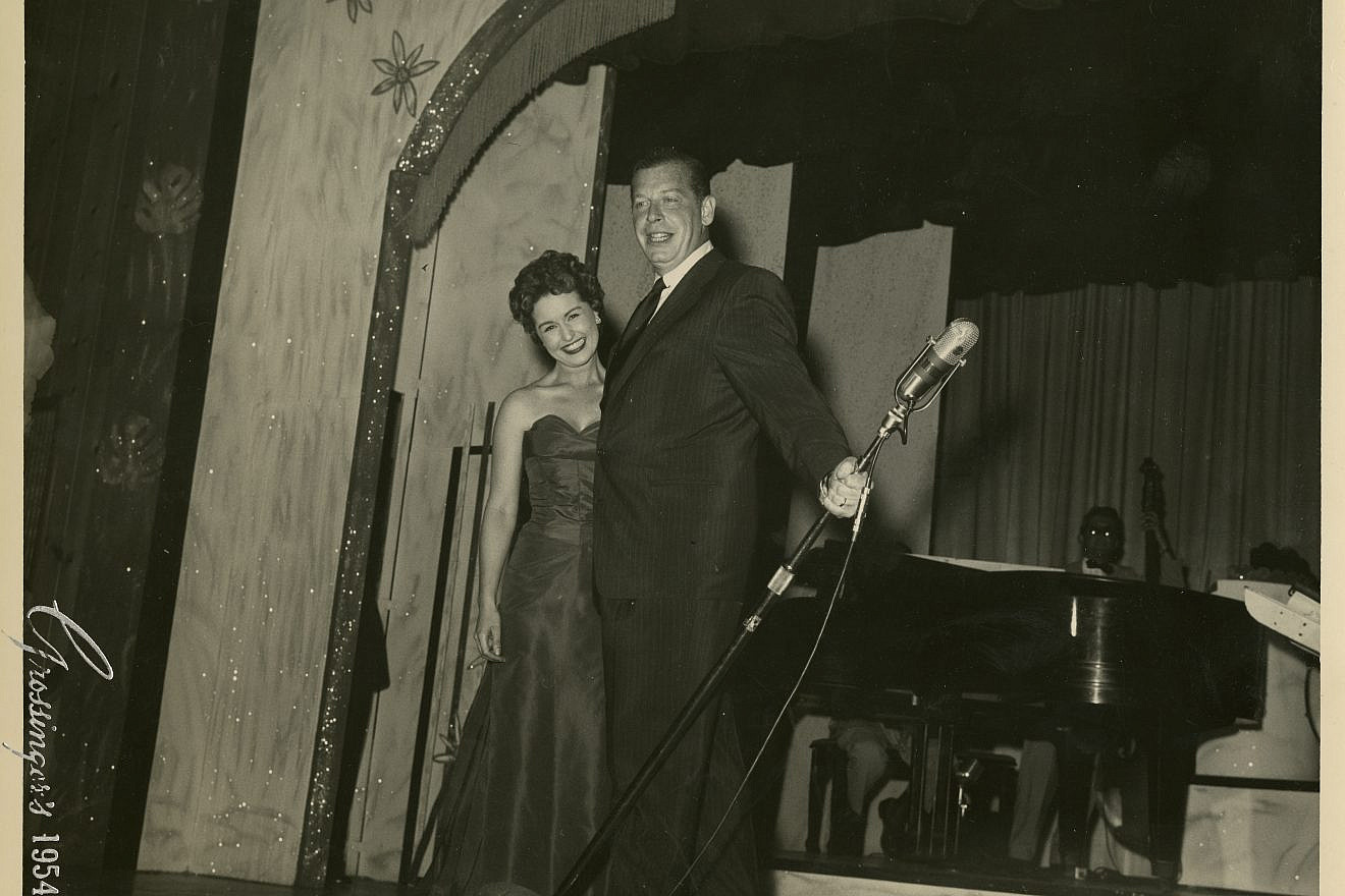 Milton Berle with an unnamed woman at Grossinger's Country Club in the Catskills in 1954. Credit: YIVO Institute for Jewish Research.