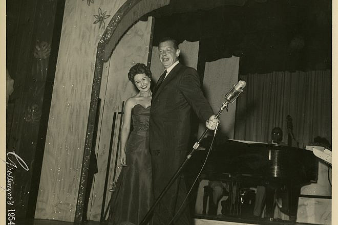 Milton Berle with an unnamed woman at Grossinger's Country Club in the Catskills in 1954. Credit: YIVO Institute for Jewish Research.