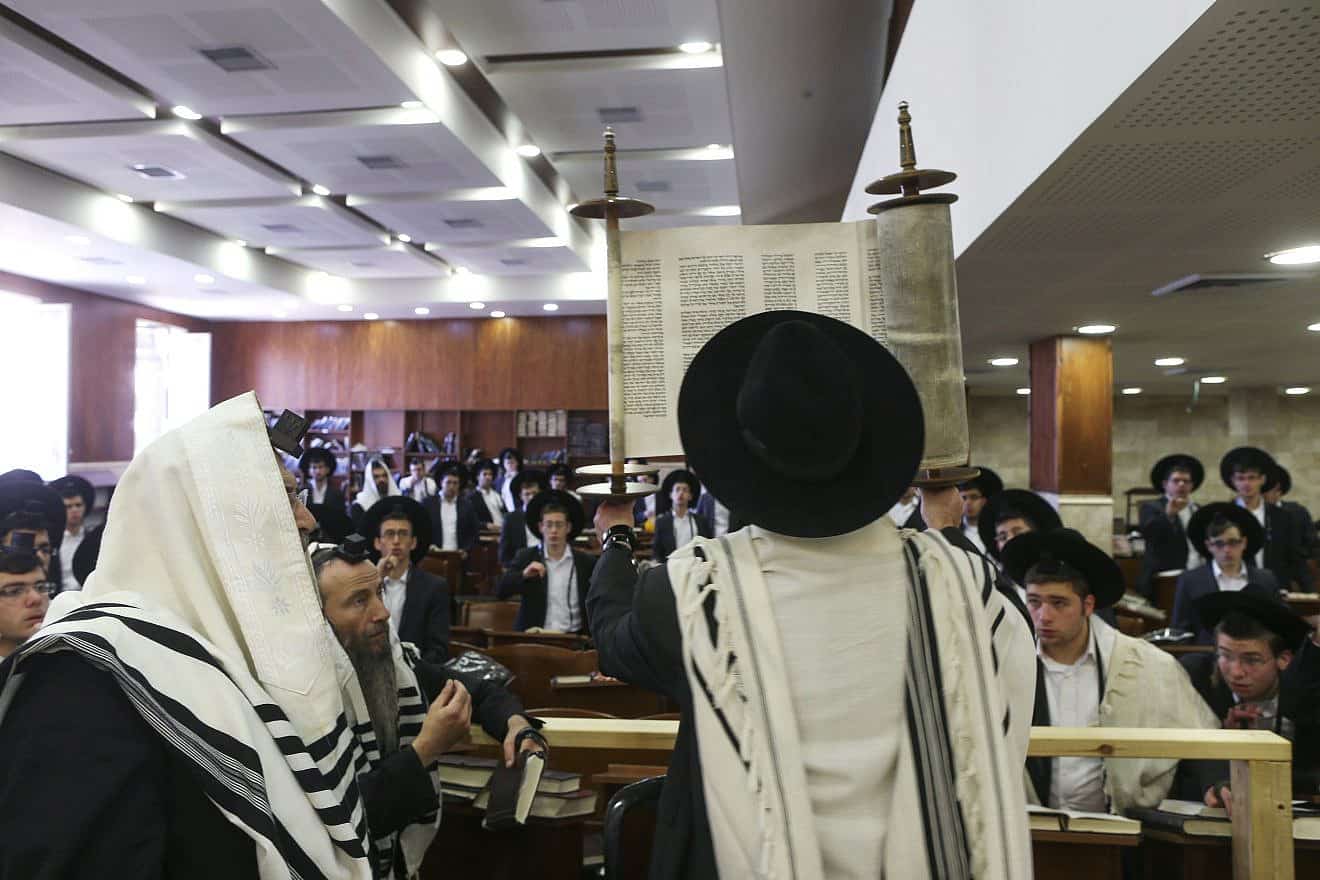 Young haredi men during morning prayers at Yeshiva Ateret Israel in Jerusalem, Sept. 12, 2013. Photo by Nati Shohat/Flash90.