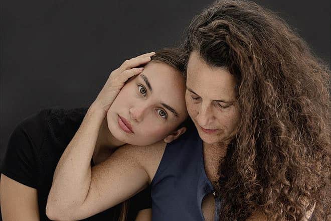 Mother Hadas and her daughter, Gaia, 21, faced the unthinkable when Gaia's younger siblings, Erez, 12, and Sahar, 16, along with their father, were kidnapped to Gaza on Oct. 7. Erez and Sahar were returned after 52 days in captivity, but their father remains a hostage. Hadas’s mother, Carmella, 80, and her niece, Noya, 12, were both killed in their home on the same day. Credit: Photo by Maya Meshel.