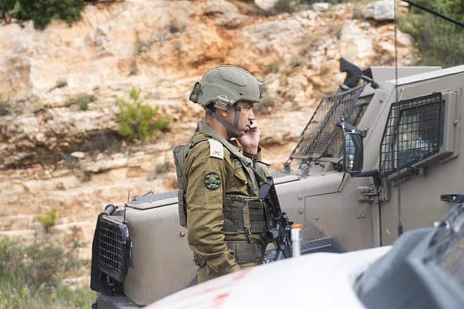 Brig. Gen. Yaki Dolf, commander of the Israel Defense Forces' Judea and Samaria Division, at the scene of a terrorist shooting near Dolev in Samaria, March 22, 2024. Credit: IDF.