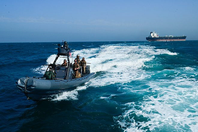 A U.S. Navy special warfare combatant craft crew returns from a simulated mission to recover a hijacked tanker on April 3, 2017. Credit: Master Sgt. Timothy Lawn/U.S. Army Photo.