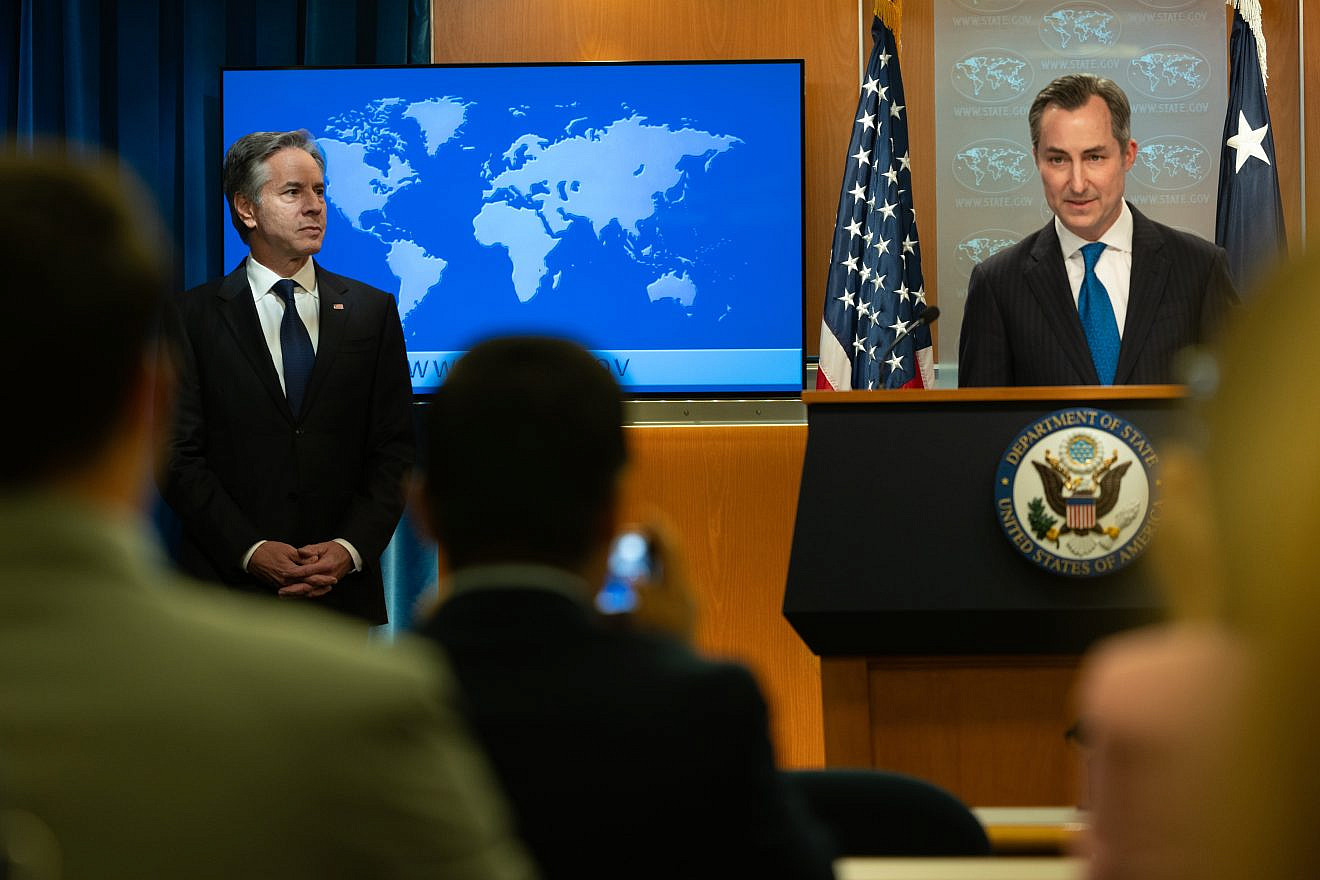 U.S. Secretary of State Antony Blinken (left) delivers remarks on the release of the 2023 Country Reports on Human Rights Practices from the press briefing room at the Department of State in Washington on April 22, 2024. Matthew Miller, the U.S. State Department spokesman, is at the microphone. Credit: Chuck Kennedy/U.S. State Department.
