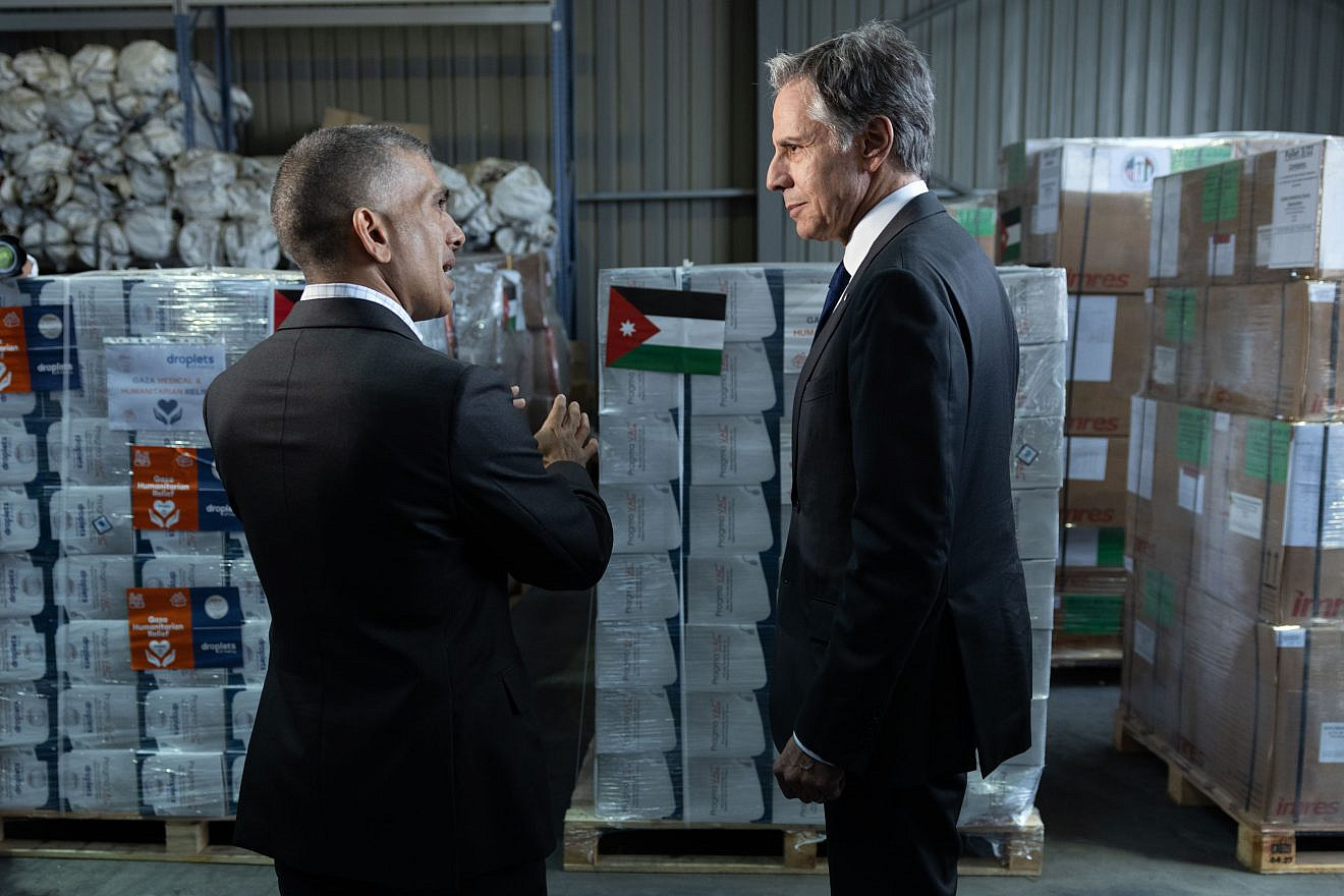 Secretary of State Antony Blinken speaks with Prince Rashid bin El Hassan at a warehouse with humanitarian aid bound for the Gaza Strip, at the Jordanian Hashemite Charity Organization in Amman, April 30, 2024. Photo by Chuck Kennedy/U.S. State Department.