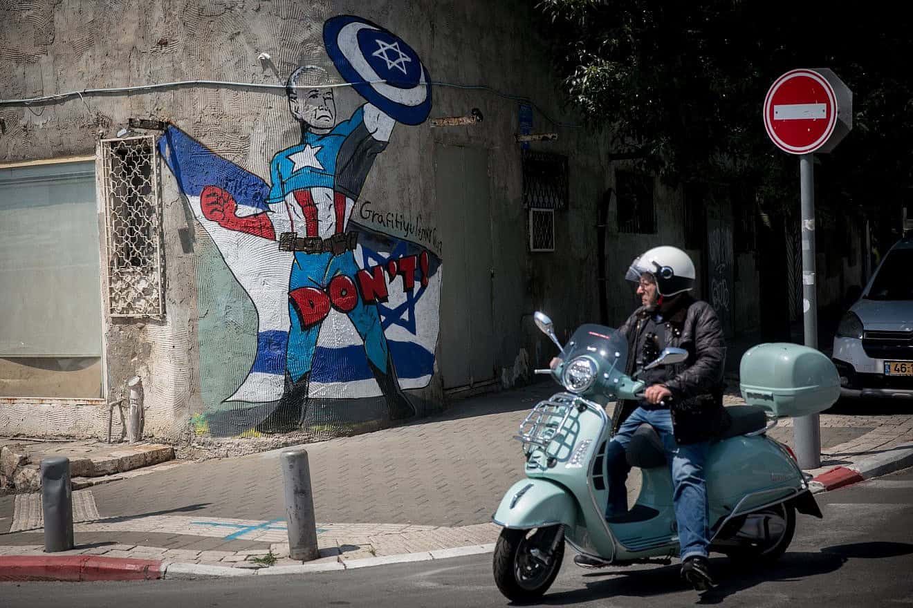 A large wall mural near Kibbutz Galuyot in Tel Aviv, depicting  U.S. President Joe Biden as a superhero defending Israel. April 15, 2024. Photo by Miriam Alster/Flash90.