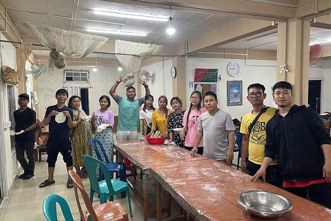 Bnei Menashe in Aizawl, Mizoram and Churachandpur in Manipur, India, prepare matzah for Passover, April 2024. Credit: Courtesy of Shavei Israel.