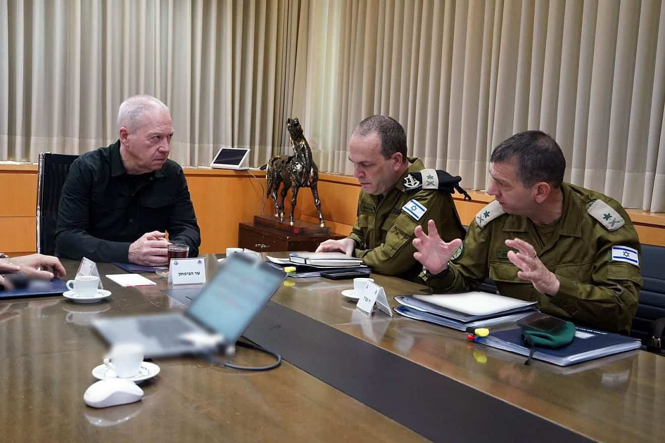 Israeli Defense Minister Yoav Gallant and two major generals discuss the Iranian threat, April 7, 2024. Photo by Ariel Hermoni/Ministry of Defense.
