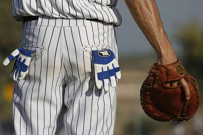 An Israeli baseball player from the Beit Shemesh Blue Socks team during a game in Kibbutz Gezer, July 26 2007. Photo by Nati Shohat/Flash90.