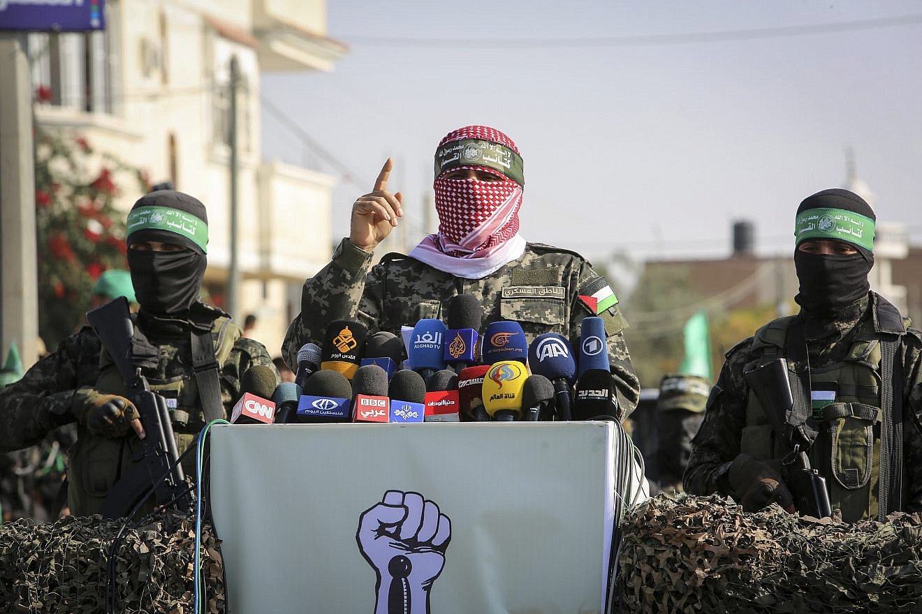 Abu Ubaida (center), the spokesman of the Izz al-Din al-Qassam Brigades, the "military" wing of Hamas, speaks in the southern Gaza Strip on Nov. 11, 2019. Photo by Abed Rahim Khatib/Flash90.