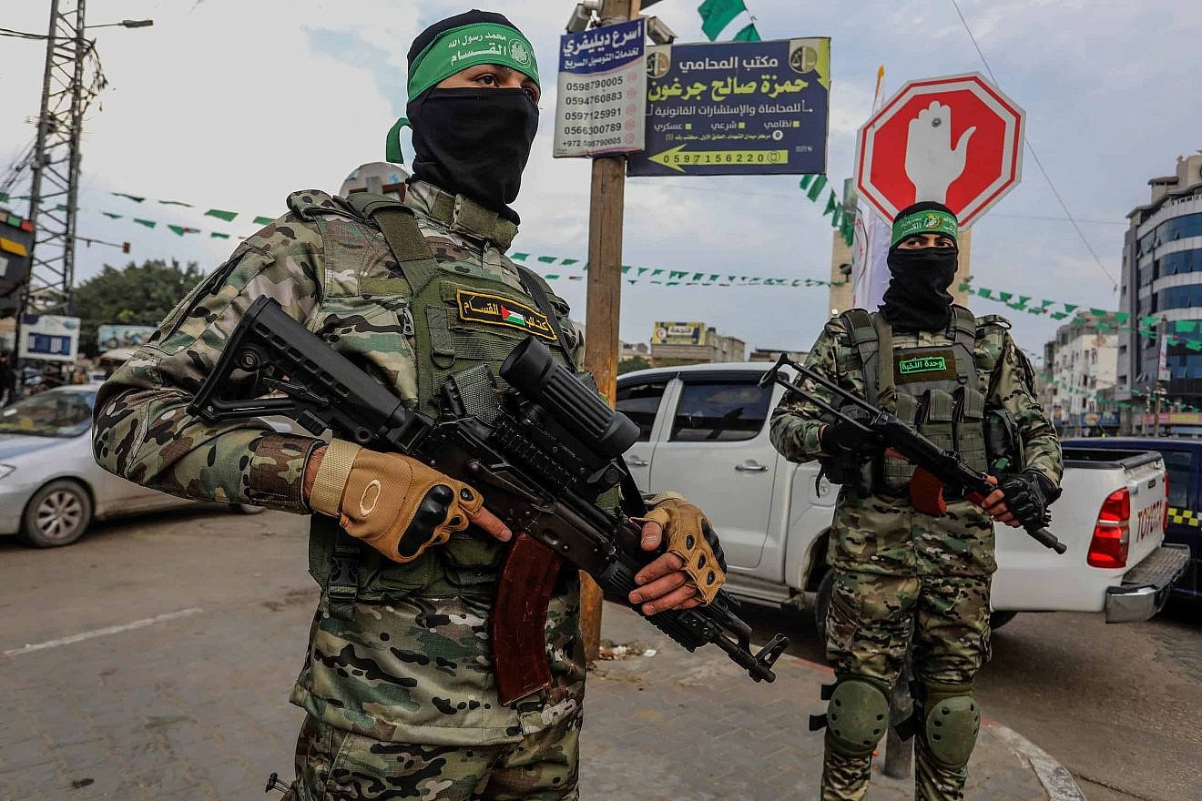 Members of Izz al-Din al-Qassam Brigades, the "military" wing of the Palestinian terrorist organization Hamas, stand guard in Rafah in the southern Gaza Strip, Dec. 14, 2022. Photo by Abed Rahim Khatib/Flash90.