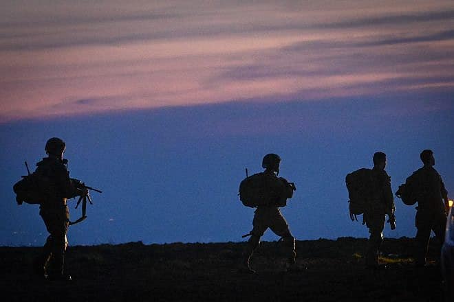 Israeli soldiers at the end of a military drill in the Golan Heights, Feb. 11, 2024. Photo by Michael Giladi/Flash90.