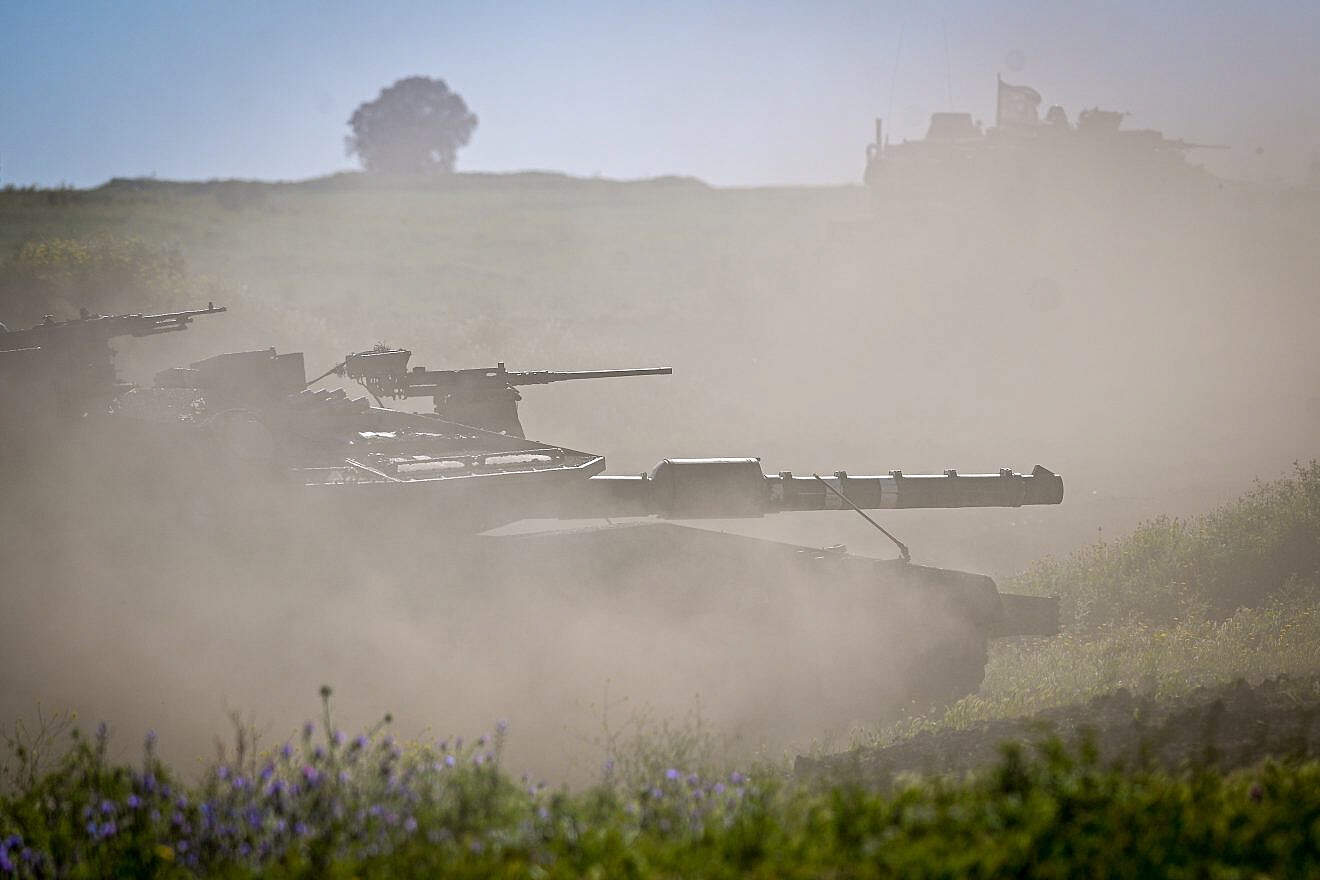 IDF tanks take part in a military exercise in the northern Golan Heights, April 1, 2024. Photo by Michael Giladi/Flash90.