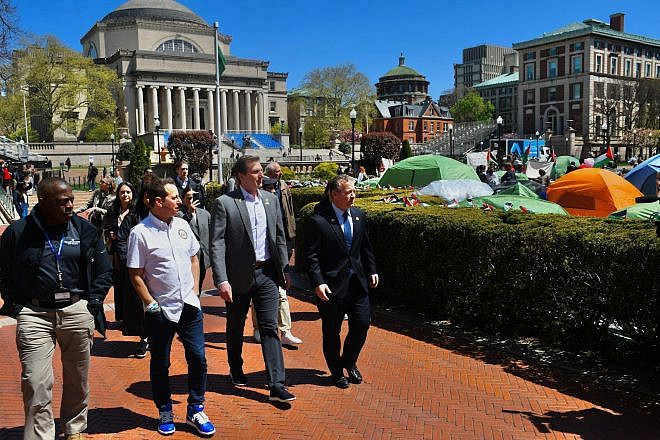Reps. Josh Gottheimer (D-N.J.), Dan Goldman (D-N.Y.) and Jared Moskowitz (D-Fla.) walk through the  Columbia University campus on April 22, 2024. Credit: Courtesy of the office of Rep. Josh Gottheimer.