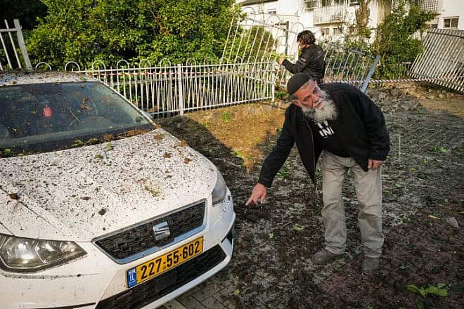 Israelis evaluate damage after the Iranian missile attack in Katzrin, the Golan Heights, April 14, 2024. Photo by Michael Giladi/Flash90.