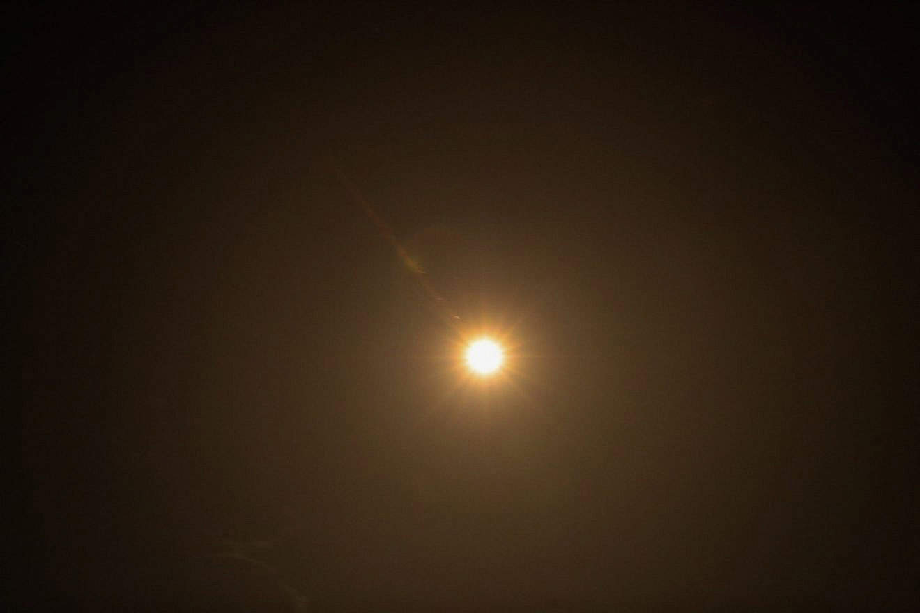 An Israeli air-defense battery fires interceptors at missiles fired from Iran, as seen from Jerusalem, April 14, 2024. Photo by Jamal Awad/Flash90.