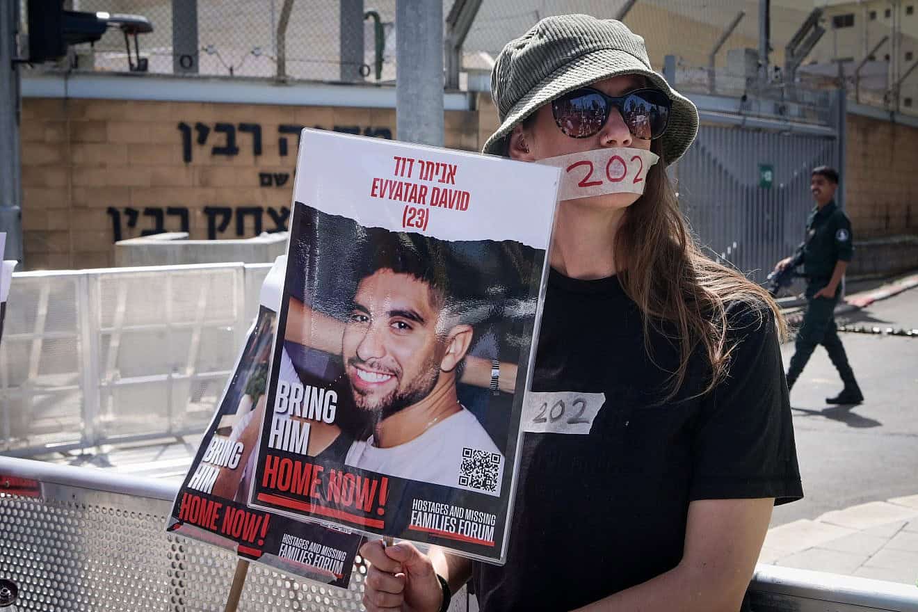 Relatives of Israelis being held hostage in the Gaza Strip since the terrorist attacks on Oct. 7, and other supporters, call for their release outside the Kirya military base in Tel Aviv on April 25, 2024. Photo by Avshalom Sassoni/Flash90.