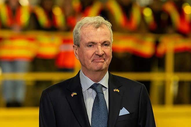 New Jersey Gov. Phil Murphy attends an event  featuring U.S. President Joe Biden speaking about the bipartisan infrastructure funding for the Hudson River Tunnel project at the West Side Yard gate in New York, Jan 31, 2023. Credit: Lev Radin/Shuterstock.