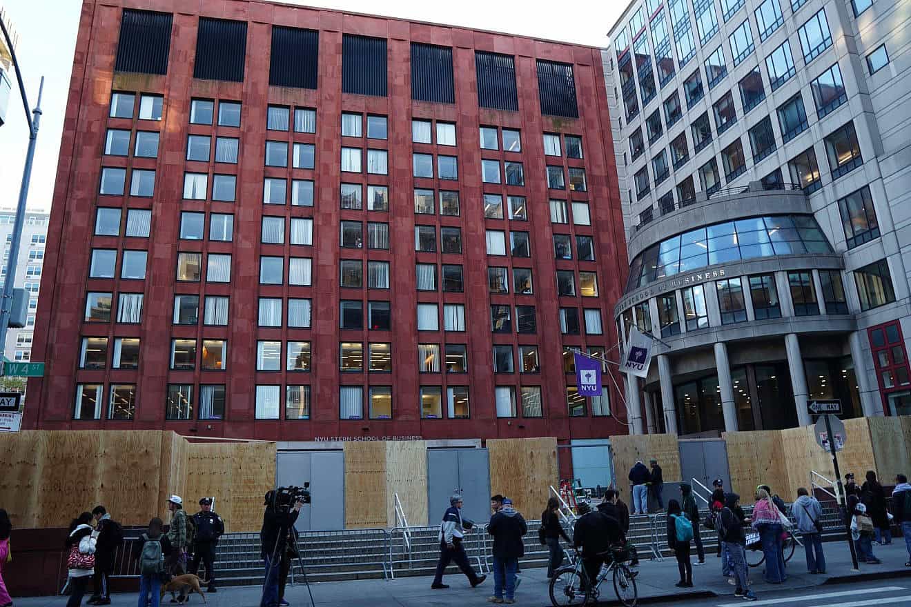 Plywood walls erected outside Gould Plaza on the campus of New York University after pro-Palestinian protests, April 23, 2024. Credit: quiggyt4/Shutterstock.