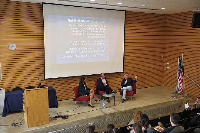 Michal Cotler-Wunsh, Israel’s special envoy for combating antisemitism at the Ministry of Foreign Affairs, Zvika Klein, editor-in-chief of “The Jerusalem Post,” and GLZ (IDF) radio’s Idan Kweller speak on a panel at the symposium. Photo by Yaniv Kopel.