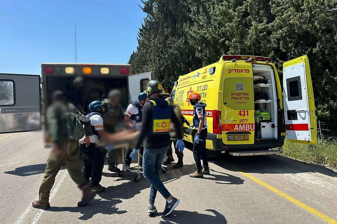 Medical and security personnel at the scene of a Hezbollah terrorist attack in Arab al-Aramshe in the Western Galilee, April 17, 2024. Credit: Magen David Adom.