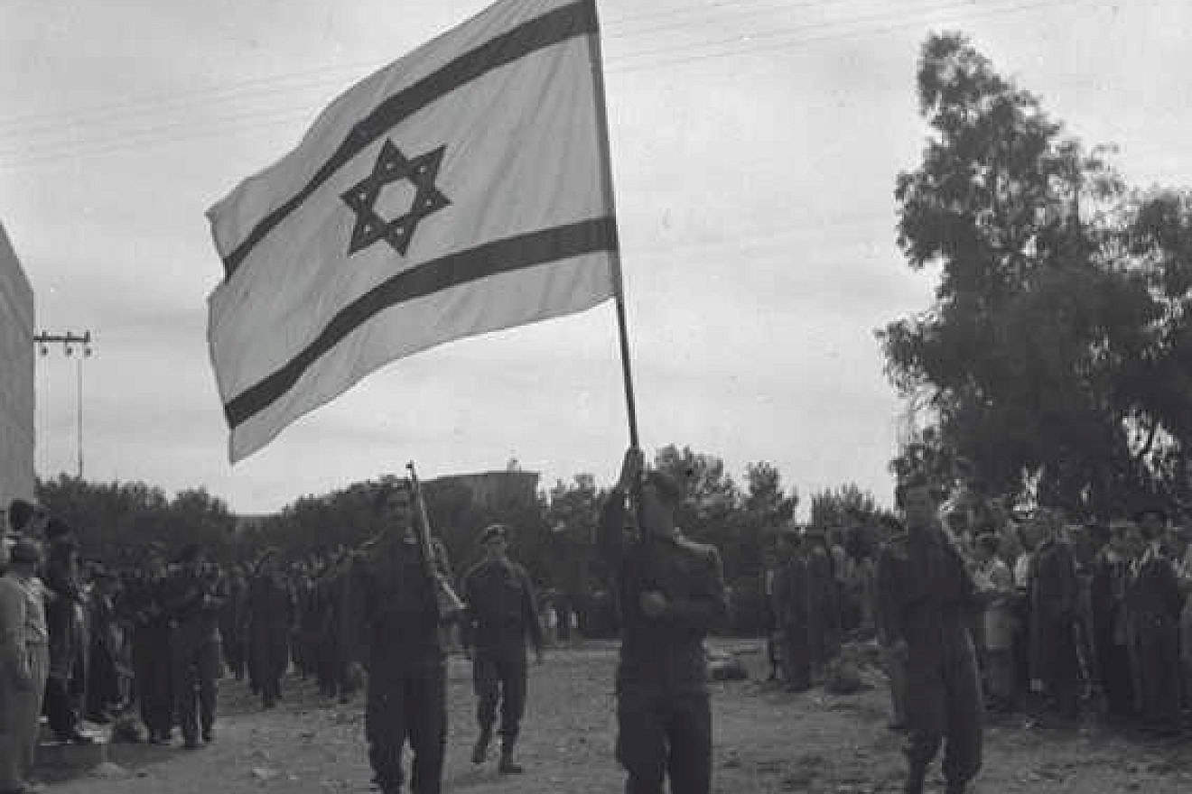 A festive parade of Jewish soldiers during Passover in Jerusalem in 1948. Credit: Rudolf Jonas, KKL-JNF Archive.