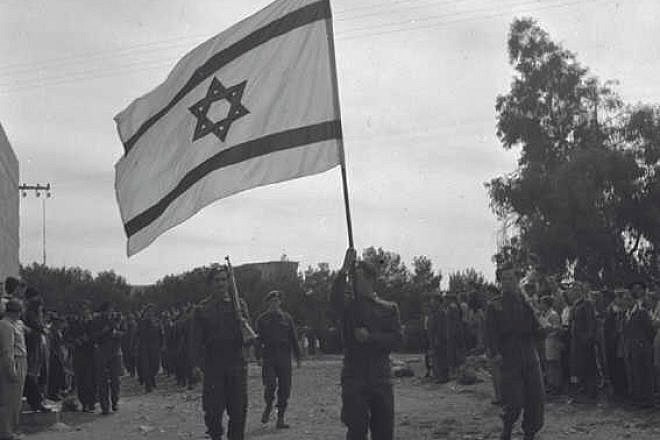 A festive parade of Jewish soldiers during Passover in Jerusalem in 1948. Credit: Rudolf Jonas, KKL-JNF Archive.
