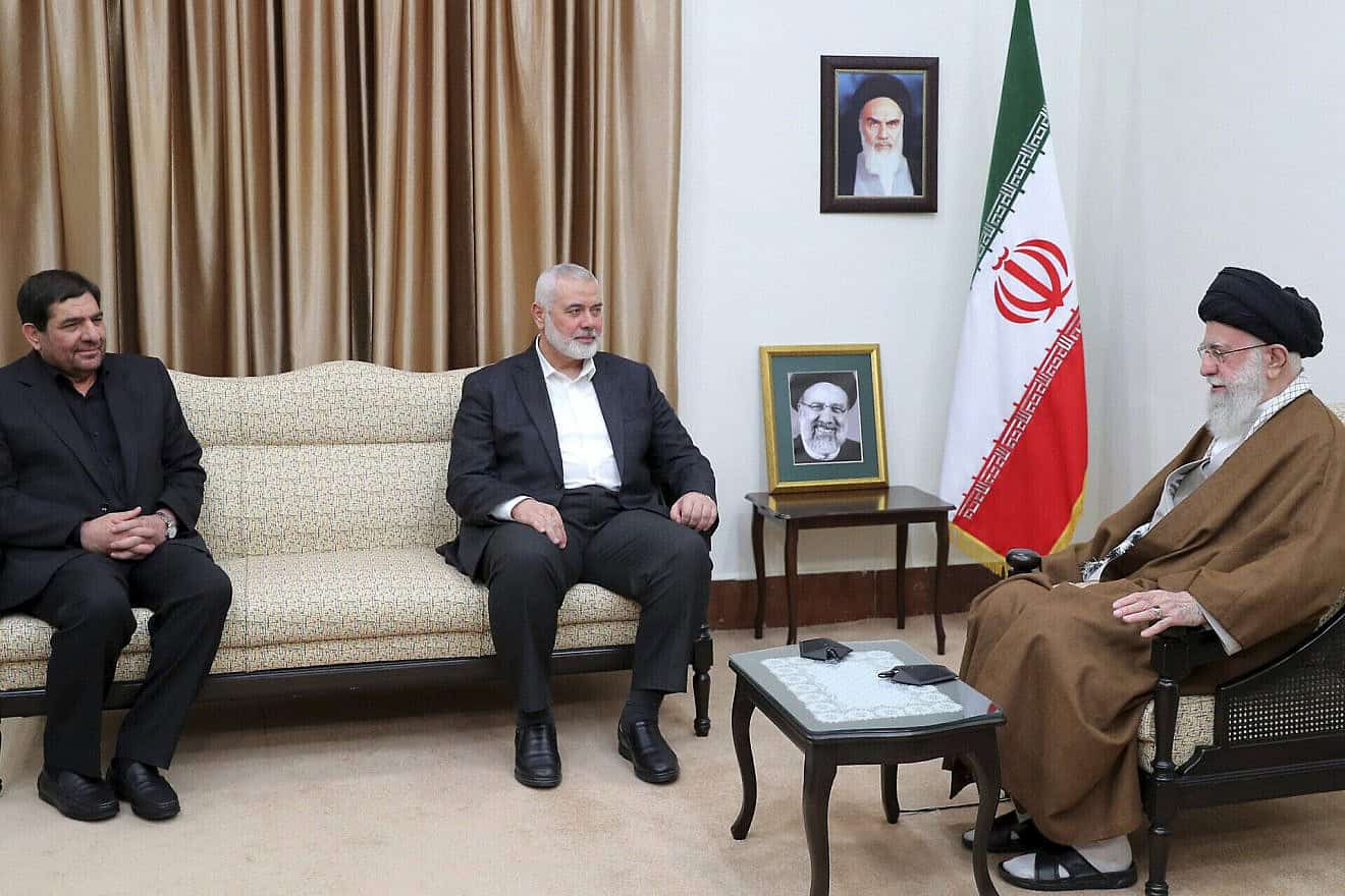 Iran's Supreme Leader Ayatollah Ali Khamenei, right, speaks with Hamas political bureau chief Ismail Haniyeh, center, as Iran's acting president Mohammad Mokhber sits at left, during their meeting in Tehran, Iran, May 22, 2024. Source: Office of the Iranian Supreme Leader.