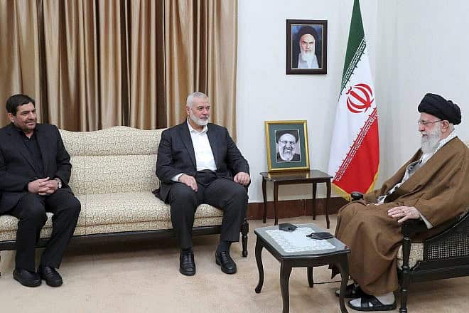 Iran's Supreme Leader Ayatollah Ali Khamenei, right, speaks with Hamas political bureau chief Ismail Haniyeh, center, as Iran's acting president Mohammad Mokhber sits at left, during their meeting in Tehran, Iran, May 22, 2024. Source: Office of the Iranian Supreme Leader.