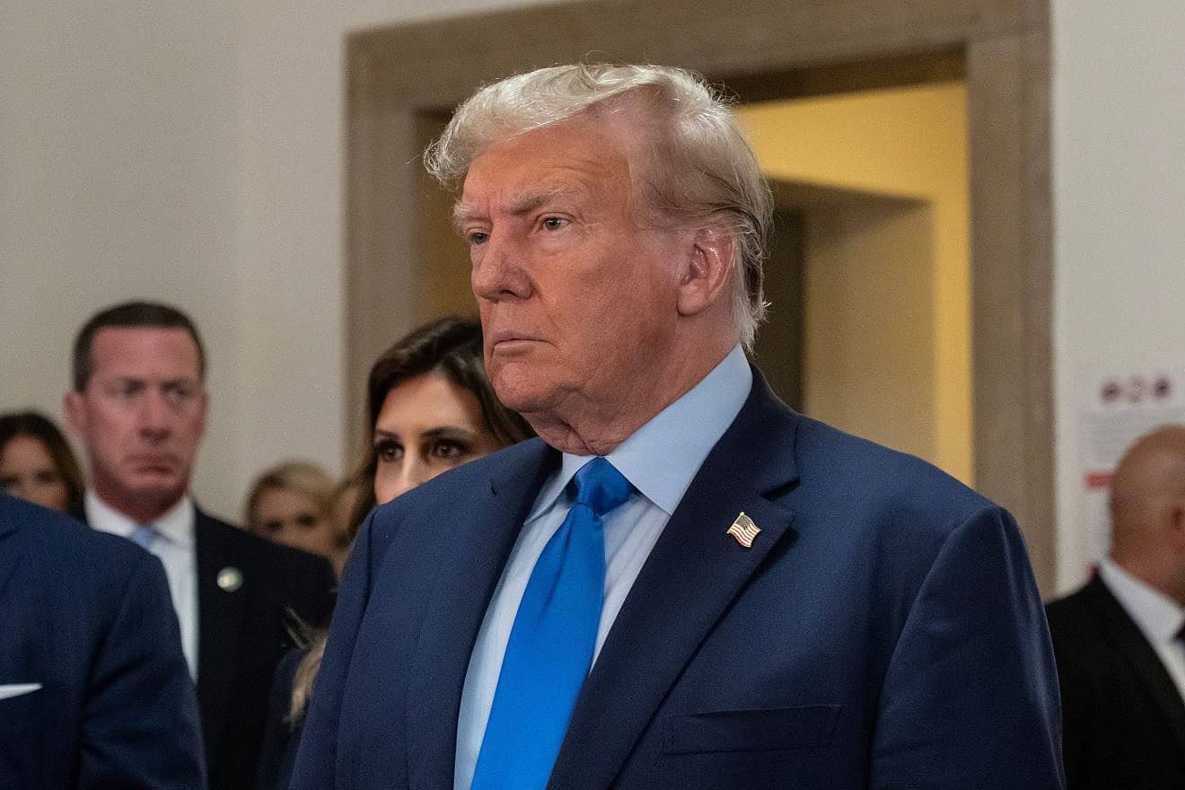 Former President Donald Trump speaks to press before the start of a civil fraud trial brought by New York State Attorney General Letitia James in New York on Oct. 2, 2023. Credit: Lev Radin/Shutterstock.
