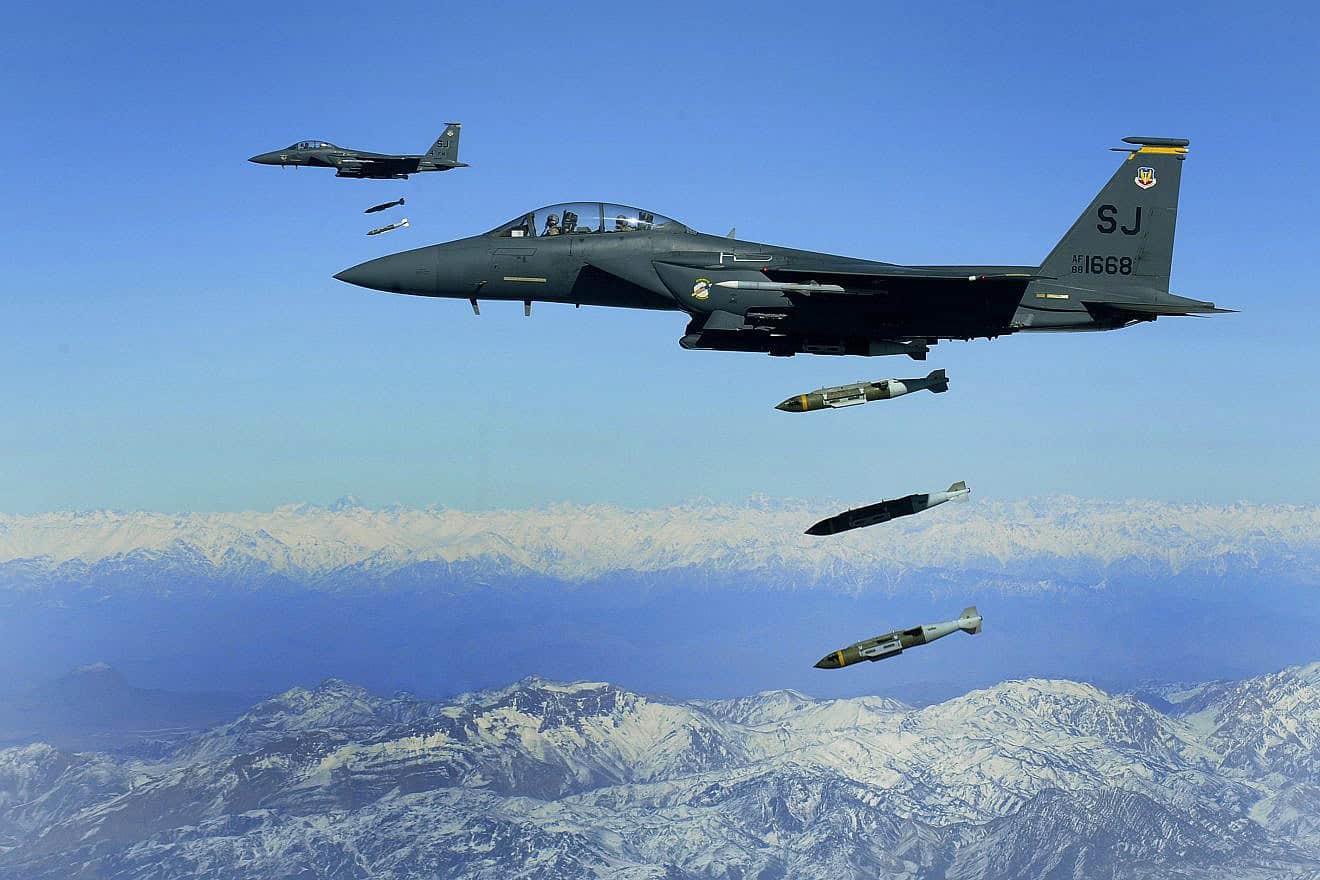 U.S. Air Force F-15Es drop 2,000-pound Joint Direct Attack Munitions on a cave in eastern Afghanistan, Nov. 26, 2009. Credit: Staff Sgt. Michael B. Keller/U.S. Air Force Photo via Wikimedia Commons.
