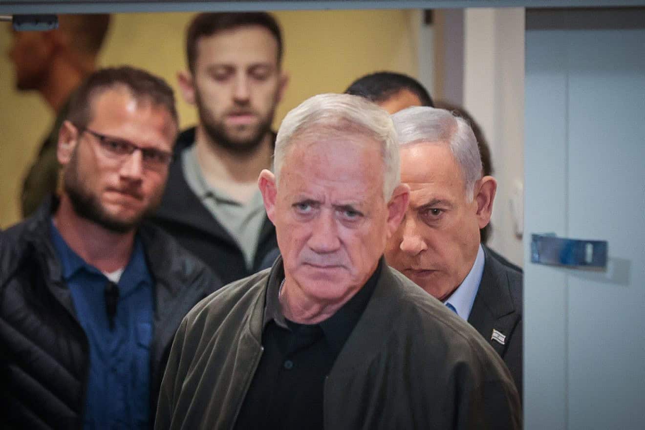 Israeli Minister Benny Gantz and Prime Minister Benjamin Netanyahu arrive at a press conference at the Defense Ministry in Tel Aviv, Dec. 16, 2023. Photo by Noam Revkin Fenton/Flash90.