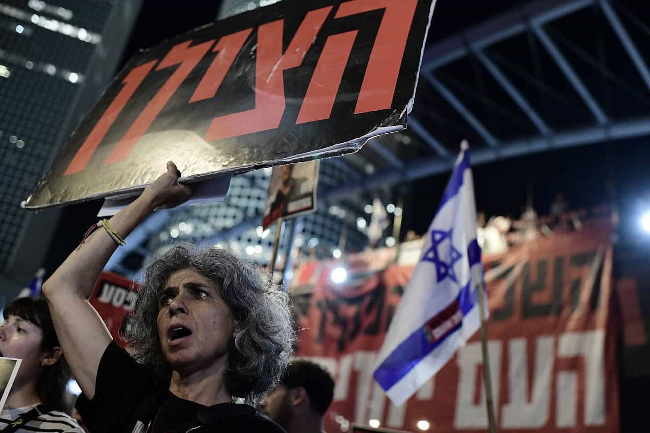 Demonstrators protest calling for the release of Israeli hostages held in the Gaza Strip outside Hakirya Base in Tel Aviv, May 22, 2024. Photo by Tomer Neuberg/Flash90.