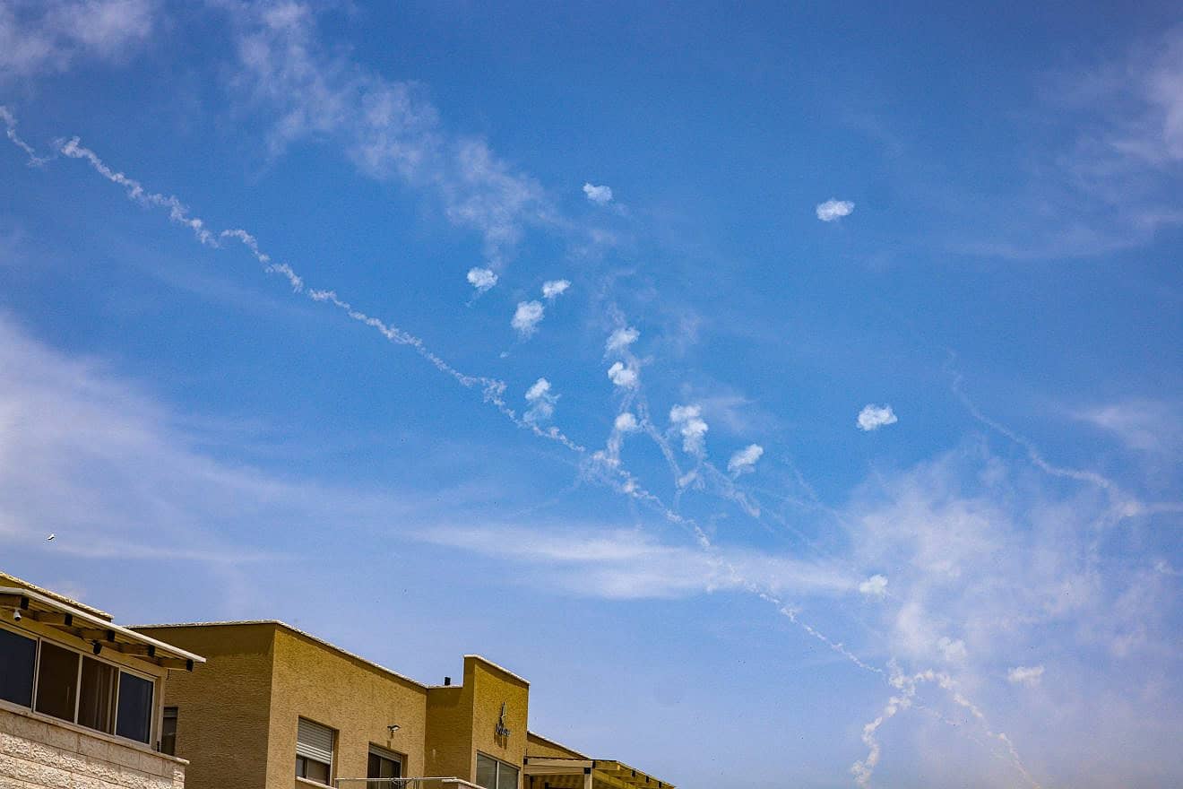 An IDF Iron Dome aerial-defense battery fires interceptor missiles at rockets fired from Lebanon, as seen from Safed, May 23, 2024. Photo by David Cohen/Flash90.