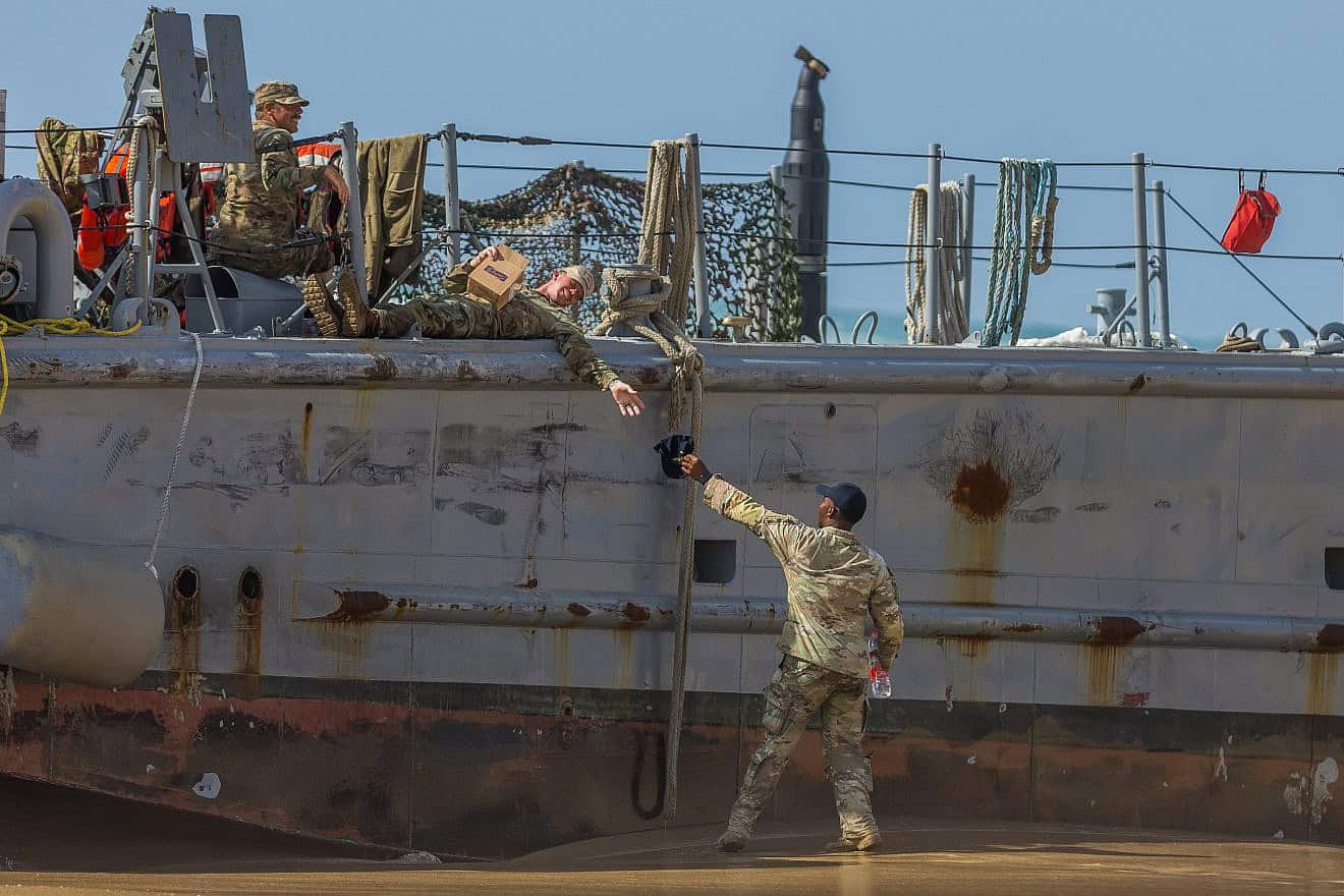 U.S. military personnel at a U.S. Army vessel that washed up on the beach in Ashdod, May 25, 2024. Photo by Liron Moldovan/Flash90.