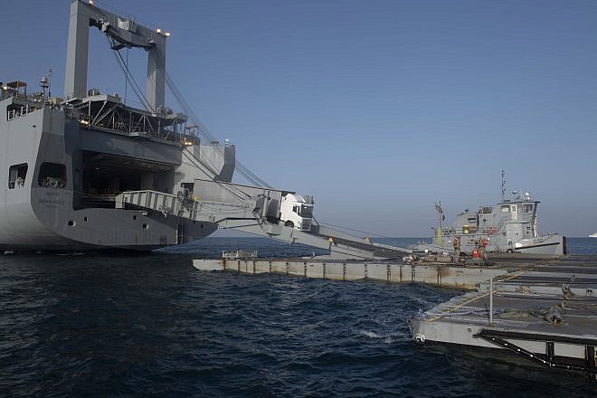 Aid trucks driving onto the U.S.-built temporary floating pier off the Gaza coast, May 17, 2024. Credit: U.S. Central Command.