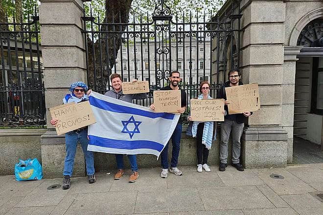 Lior Tevet (second from right) and friends protest against a pro-Palestinian rally in Ireland. Credit: Courtesy.
