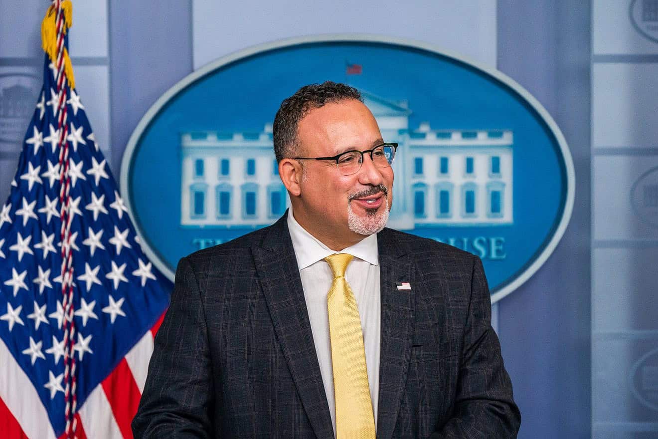 U.S. Secretary of Education Miguel Cardona talks with reporters during a press briefing in the James S. Brady Press Briefing Room of the White House on Aug. 5, 2021. Credit: Official White House Photo by Cameron Smith.