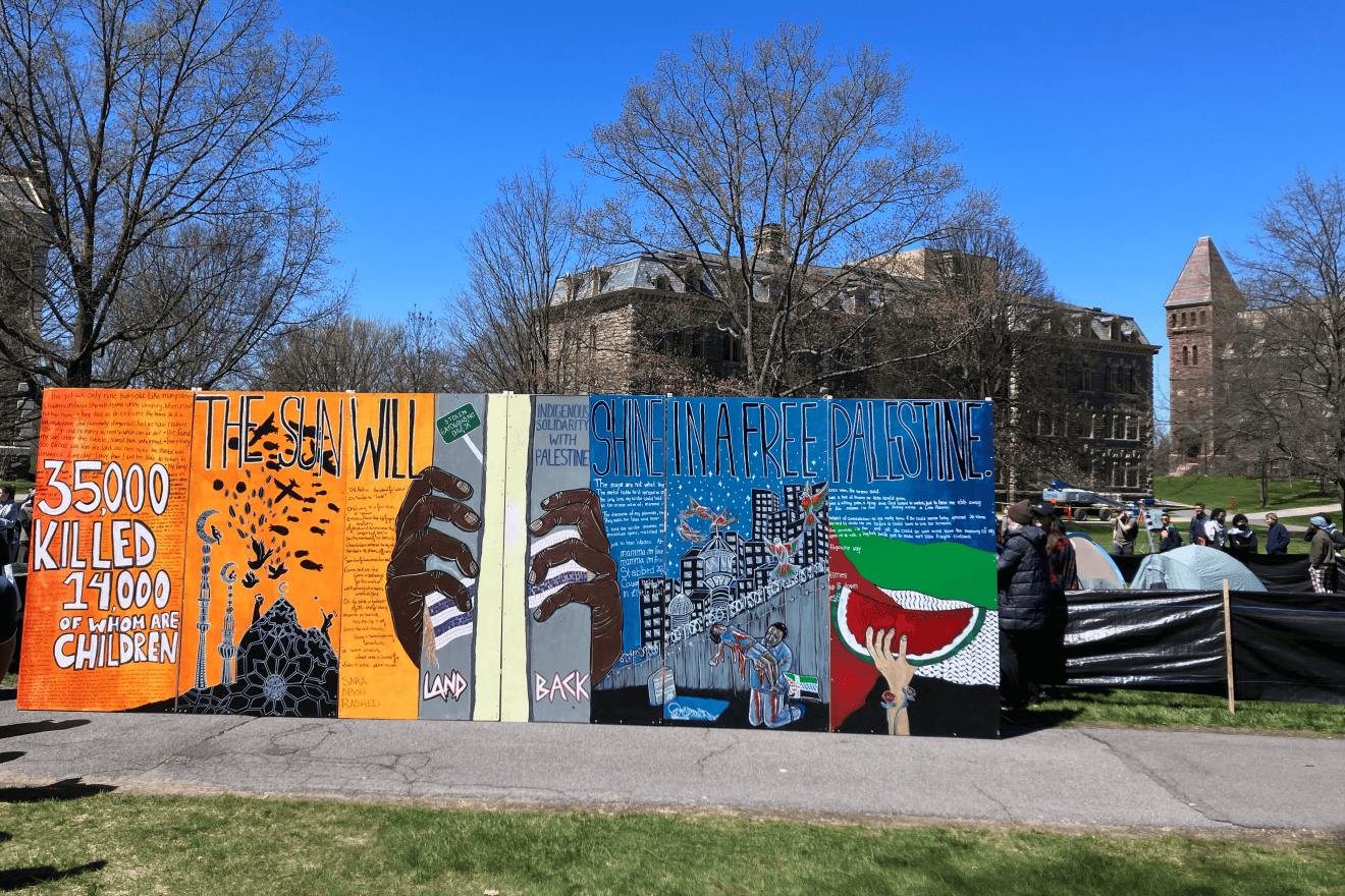 “The Sun Will Shine in a Free Palestine” mural at the Arts Quad of Cornell University in Ithaca, N.Y., in front of a pro-Palestinian, anti-Israel student tent encampment on April 25, 2024. Credit: Hstoops via Wikimedia Commons.