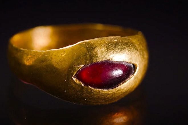 A 2,300-year-old gold ring found at the Givati Parking lot excavation in the City of David. Credit: Asaf Peri/City of David.