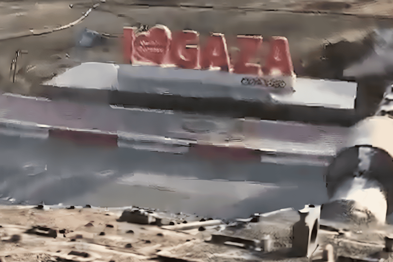 An Israel Defense Forces tank crushes an "I heart Gaza sign" at the Rafah Border Crossing in the Strip, May 7, 2024. Credit: Screenshot.