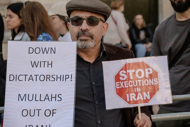 A protest in 2023 against policies of the Iranian in Trafalgar Square, the United Kingdom. Credit: Koca Vehbi/Shutterstock.