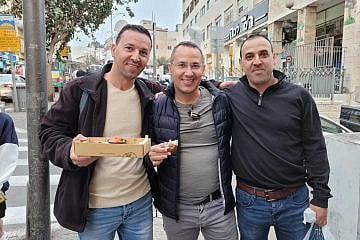 From left, brothers Yossi, Sharon and Eli Sharabi. Credit: Courtesy of the Hostage and Missing Families Forum.
